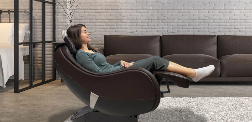 A woman relaxing after buying a massage chair, enjoying a soothing massage at home.